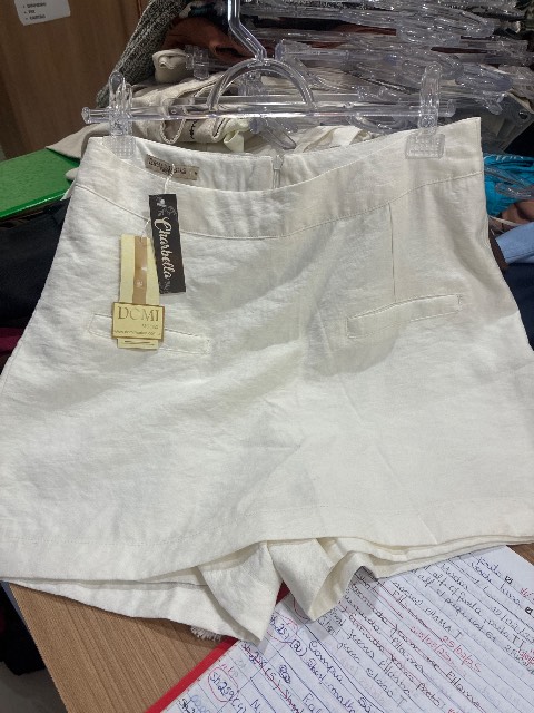 Short saia c/ dois bolsos facas na frente